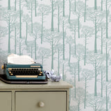 'Holkham Pine Woods' Wallpaper in Seafoam Green