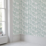 'Holkham Pine Woods' Wallpaper in Seafoam Green